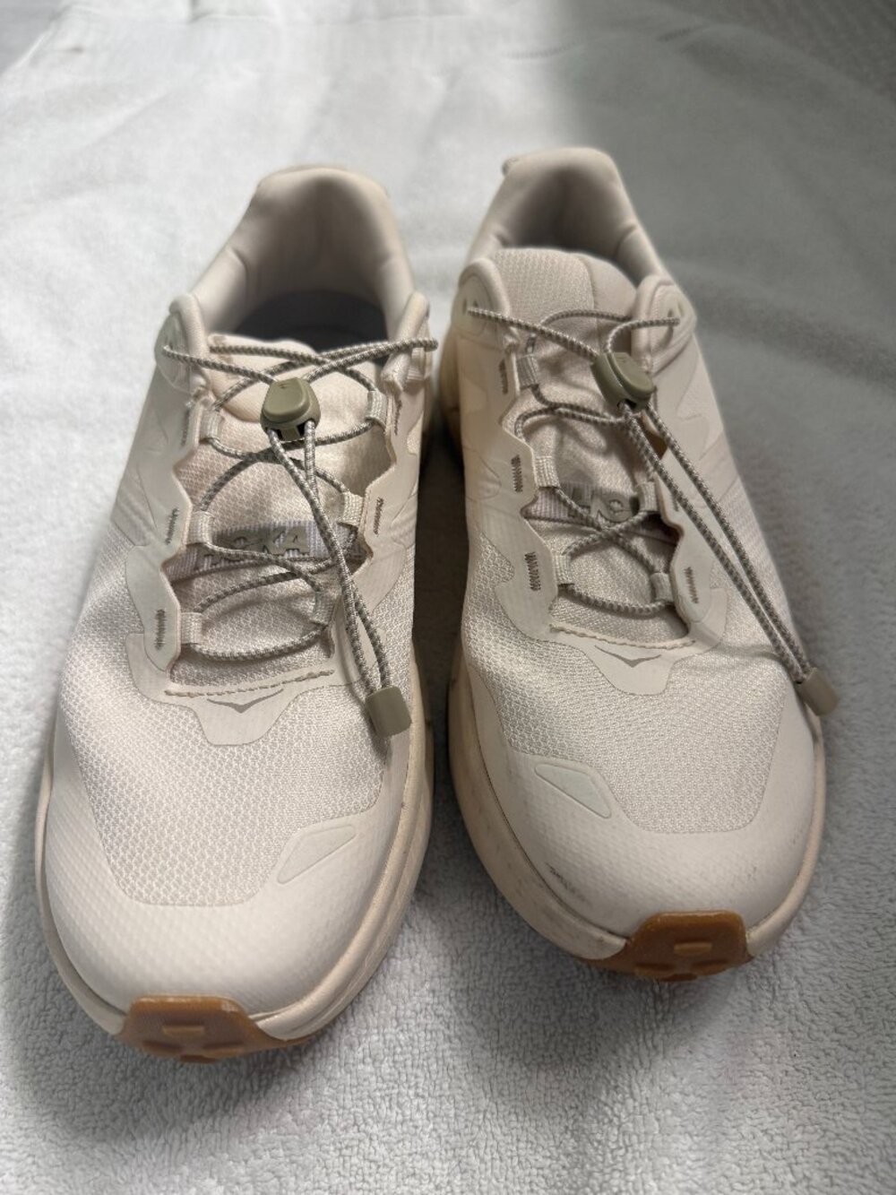 Hoka Transport sneakers in the Eggnog 9.5B
